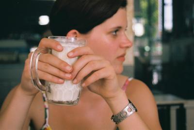 23: Anna's hands holding a cup of ayran