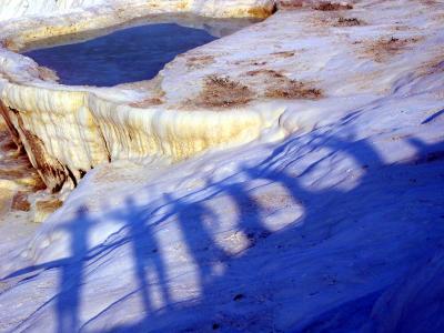 2: Pamukkale and Hierapolis. The shadows of every person is a letter, conected with the place. Can you read it?