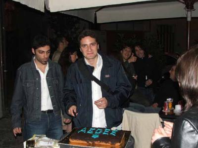 13: President Massi cuts the cake