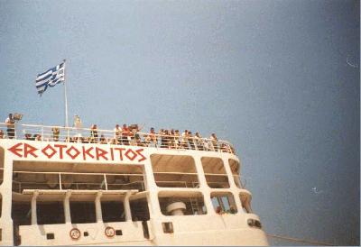 12: Waving people from the back of the boat ...