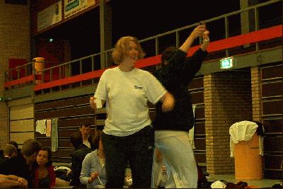 1: People dancing in the gym after breakfast.