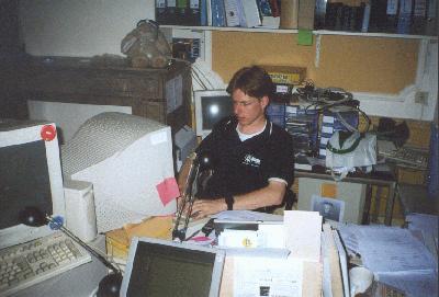 2: Mark working behind the computer